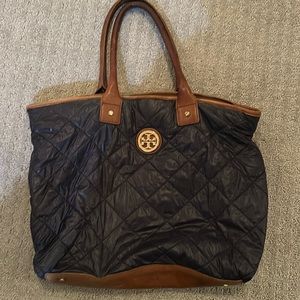 Well loved Tory Burch Purse but still has a lot of life in it!